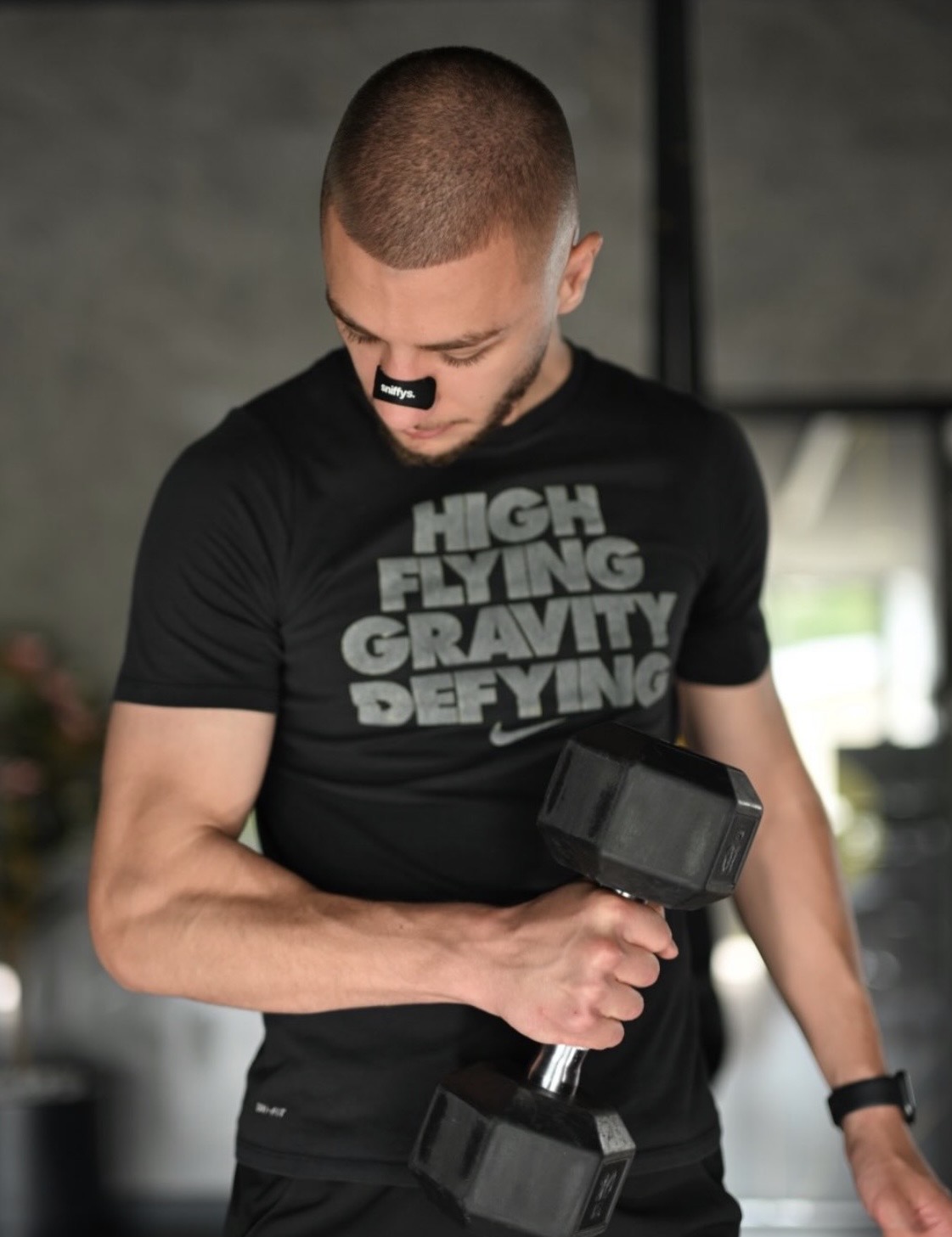 Coach Erion Hamiti coaching a strength session at the Bravo7 Fitness center in Skopje